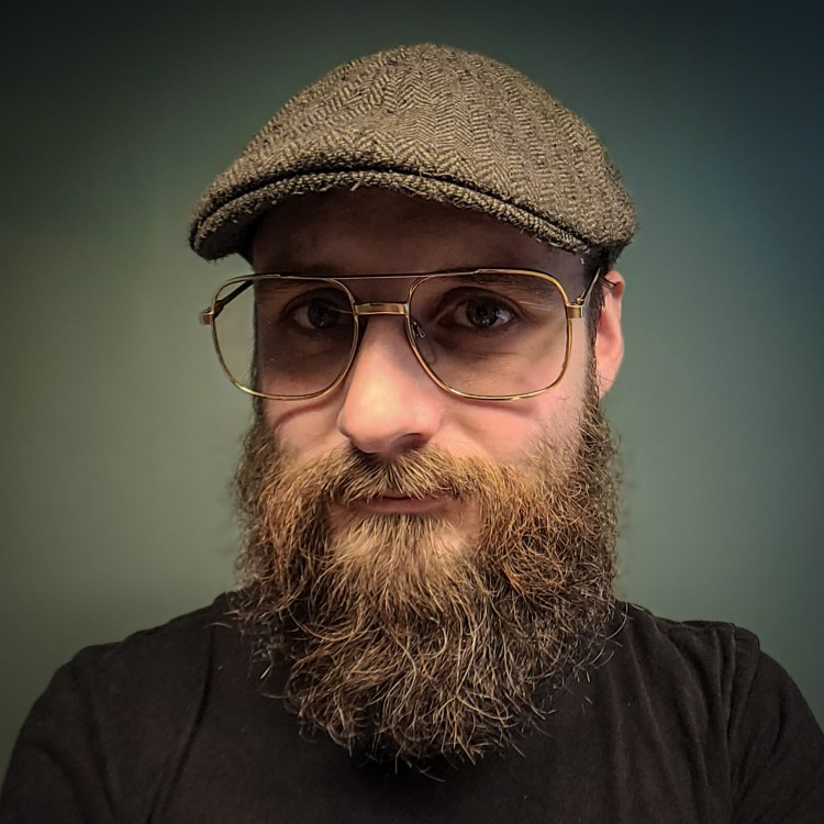 A portrait of Robin Rolfhamre, PhD, CEO of solidskilly.