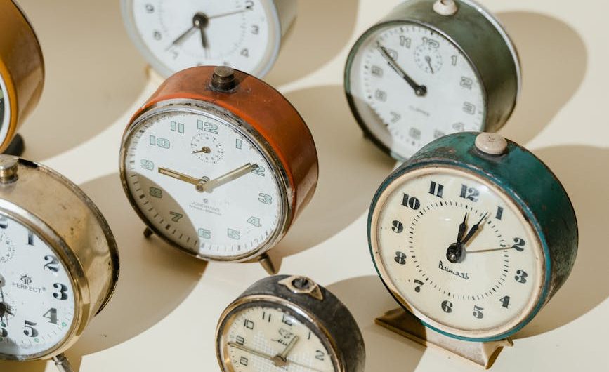 collection of antique alarm clocks